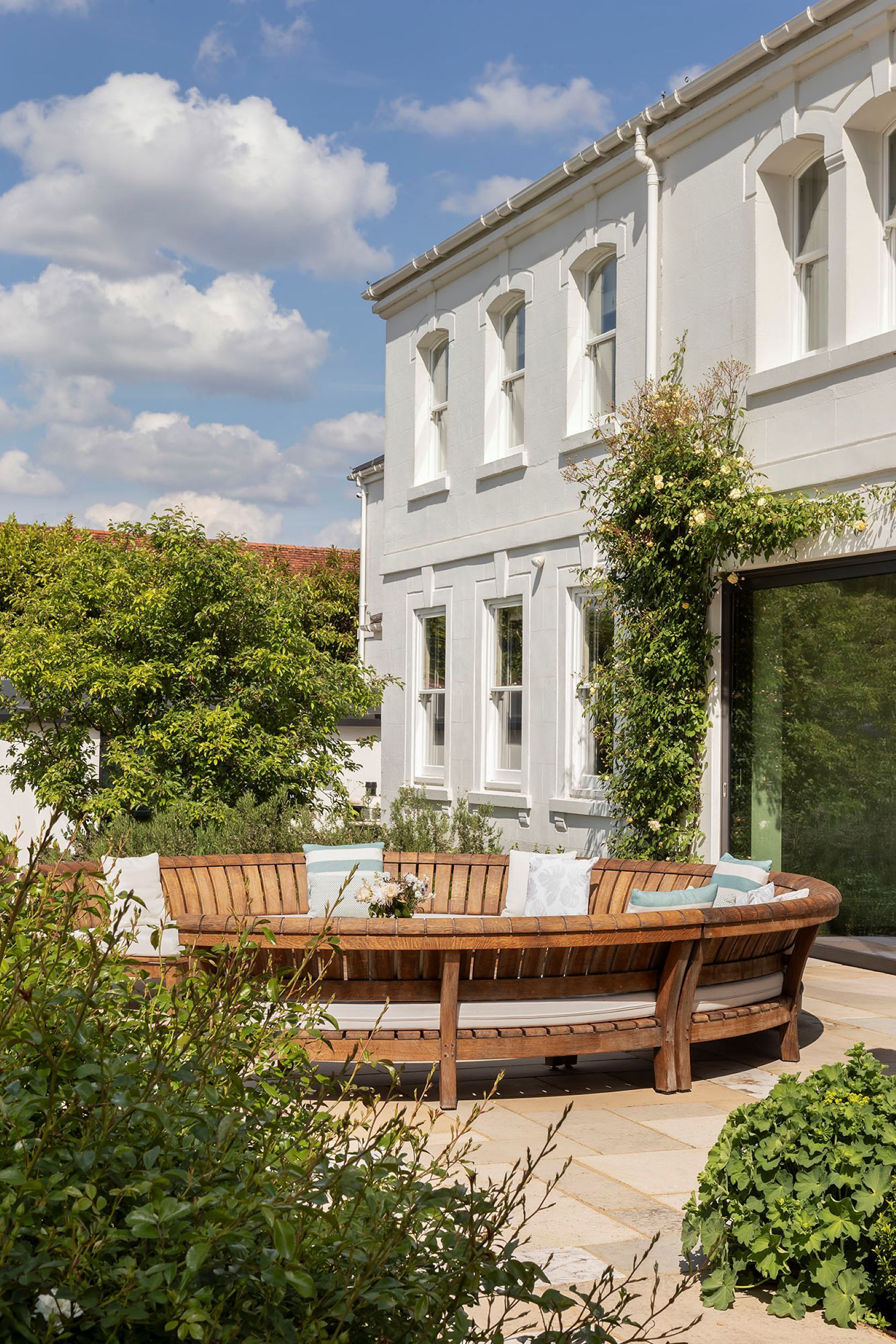 Torban Hall exterior terrace lounge chairs portrait
